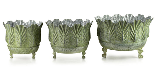 Macetas decorativas verdes en metal