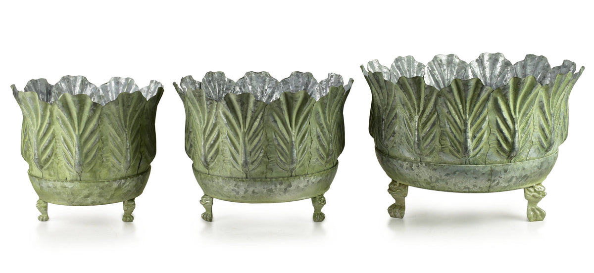 Macetas decorativas verdes en metal
