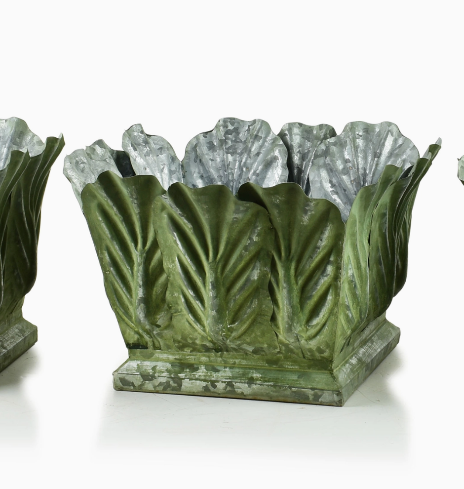 Macetas decorativas verde en metal