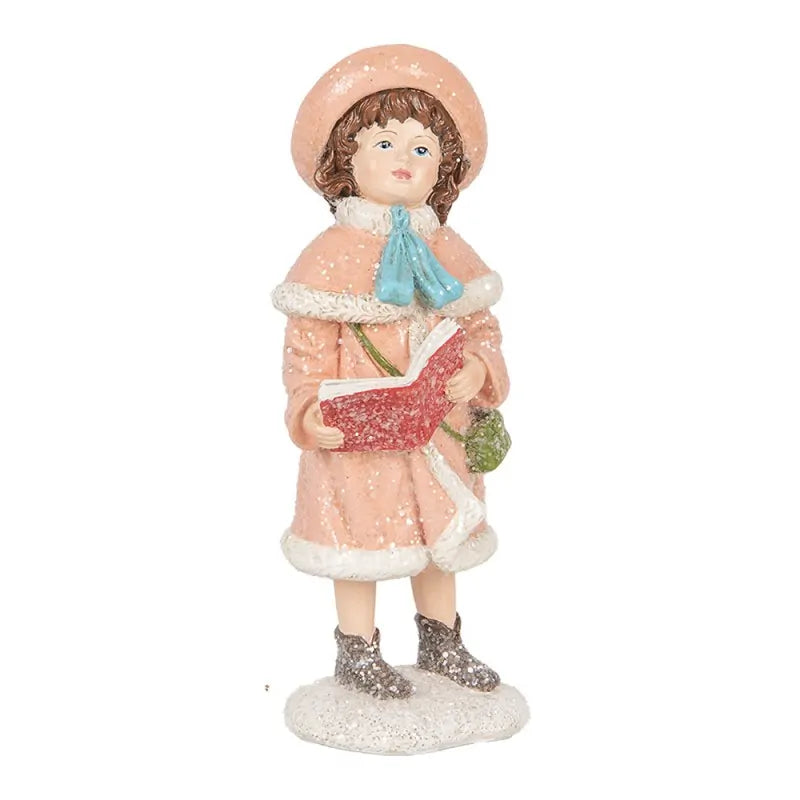 Figura decorativa infantil – Niña con abrigo rosa y libro de villancicos