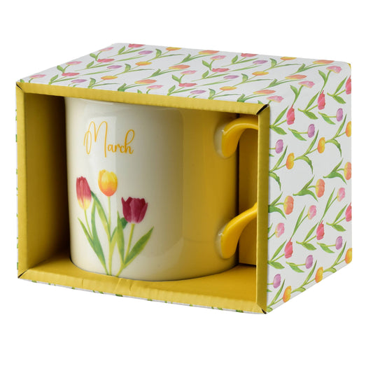 Taza amarilla de porcelana, mes de marzo