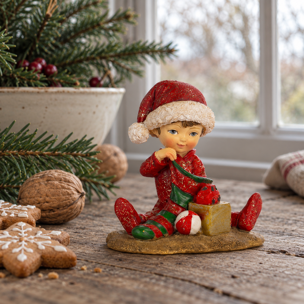 Figuras en forma de niño con gorro de Santa