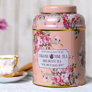 Bote de lata con bolsas de té rosa vintage